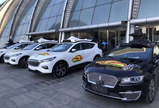 Beijing launches first manned autonomous driving test
