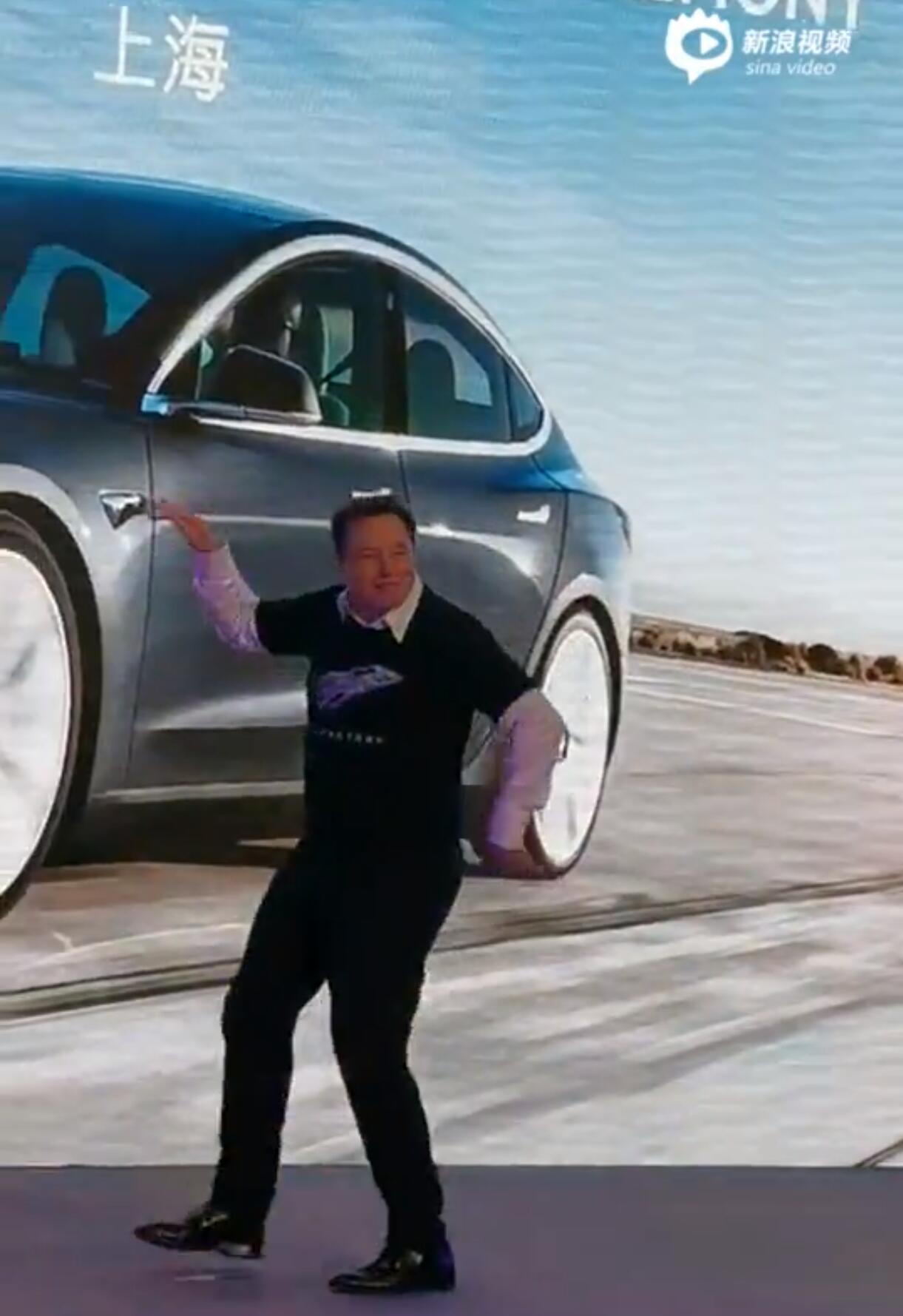 Musk dances as China-made Model 3 delivered to 10 owners