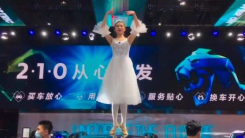 While Tesla owner protests atop a car, another carmaker shows ballet in similar setting