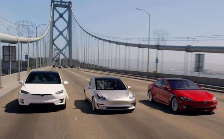 Tesla posts record earnings, warns of supply chain uncertainty