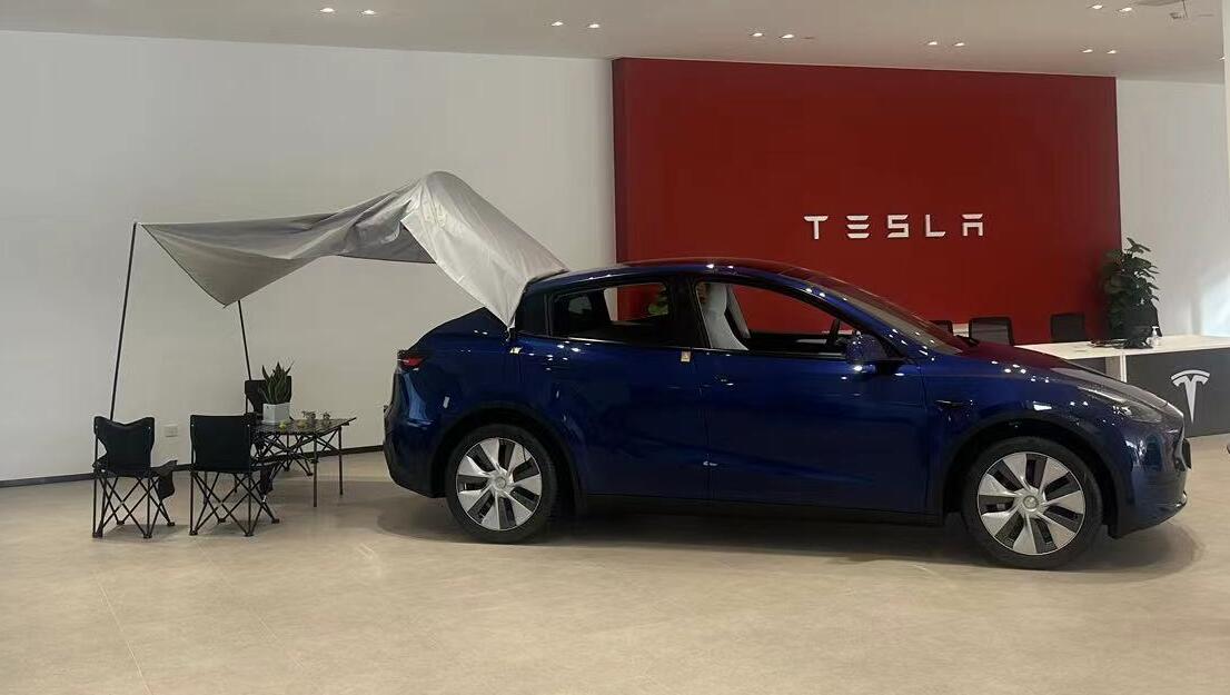 Tesla sets up new-energy firm in Shanghai with registered capital of million