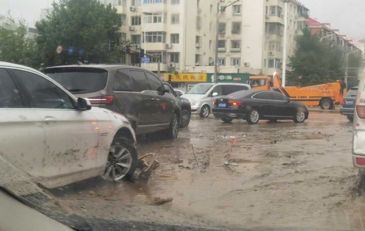 Beijing hit by rare rainstorms and floods