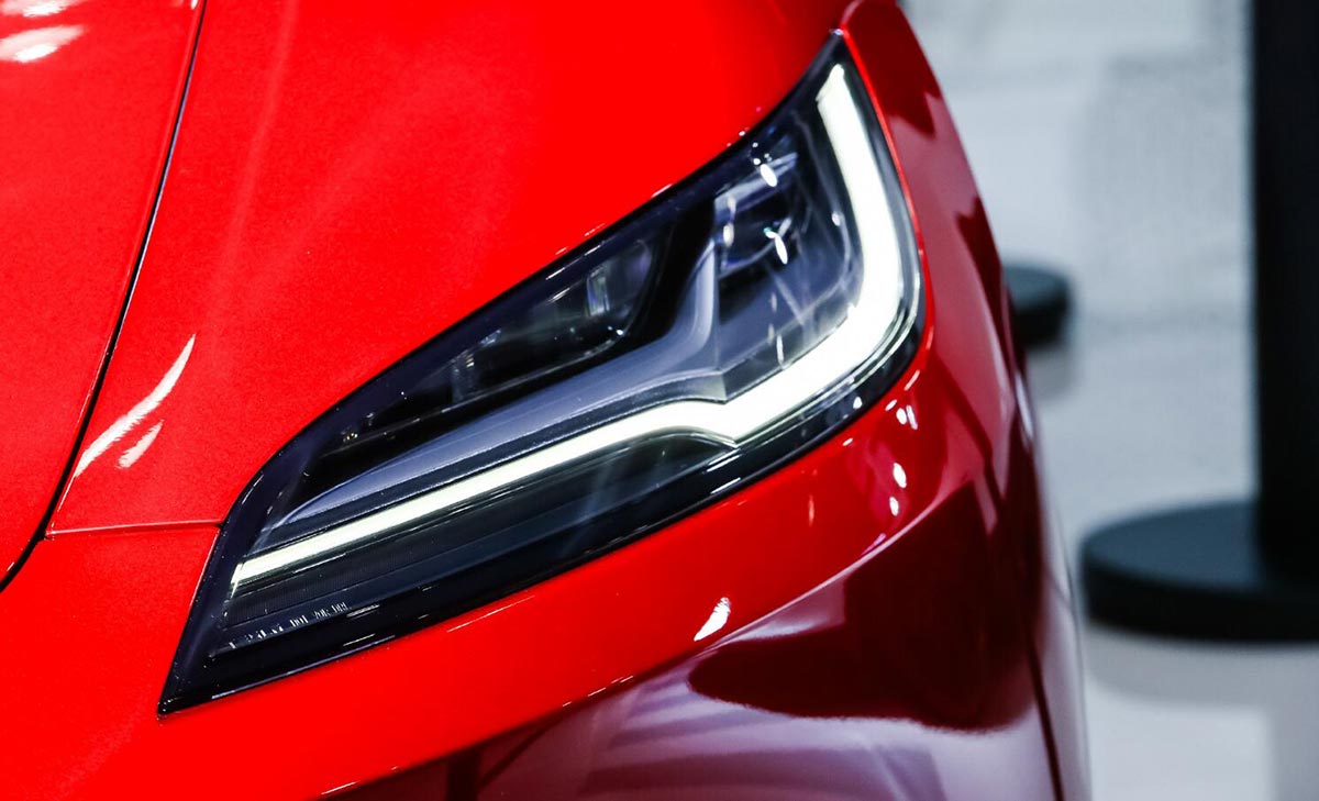 Tesla's revamped Model 3 makes real-life China debut at Beijing trade fair