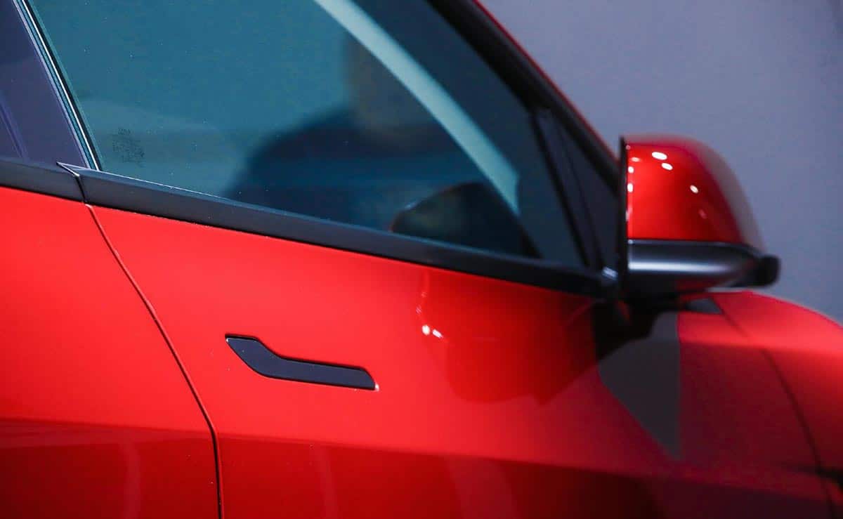 Tesla's revamped Model 3 makes real-life China debut at Beijing trade fair