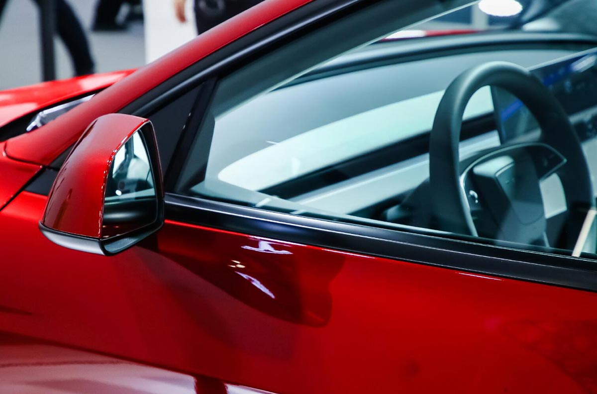 Tesla's revamped Model 3 makes real-life China debut at Beijing trade fair