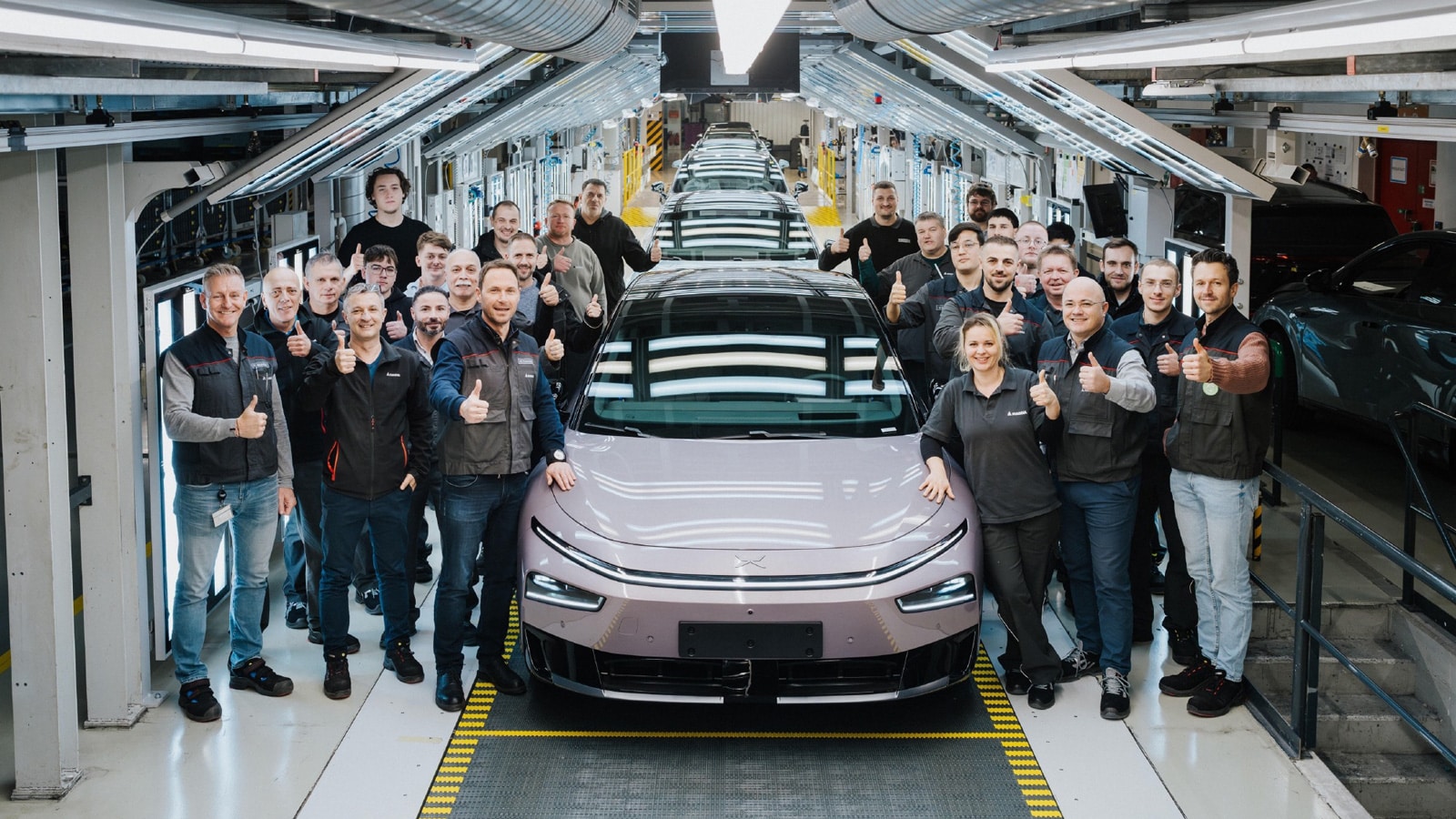 Xpeng team celebrates the completion of the trial production of the 2026 P7+ at its Austrian factory.
